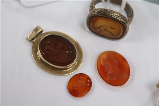 A 9ct gold mounted oval intaglio pendant and other items including seals and a ring.